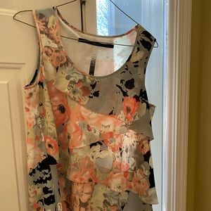 Cute ruffled shell. Great gif under a suit coat or a longer cartigen